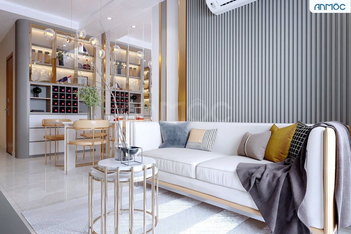 Căn phòng này được gia chủ lấy màu xám làm chủ đạo, sau đó kết hợp với màu xanh lá của bộ ghế và lùm cây phía sau tạo thêm điểm nhấn "xanh" cho căn phòng can-phong-nay-duoc-gia-chu-lay-mau-xam-lam-chu-dao-sau-do-ket-hop-voi-mau-trang-kem-cua-bo-ghe-va-tao-them-diem-nhan-inox-ma-vang-cho-can-phong