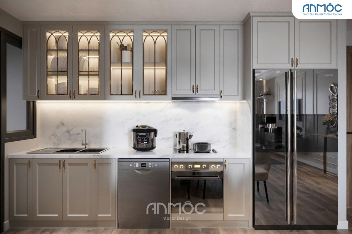 55+ Mẫu Thiết Kế Nội Thất Chung Cư "Đỉnh Nhất" 2026 3444 Bếp phối tông xám – trắng với tủ kính trang trí và thiết bị cao cấp.