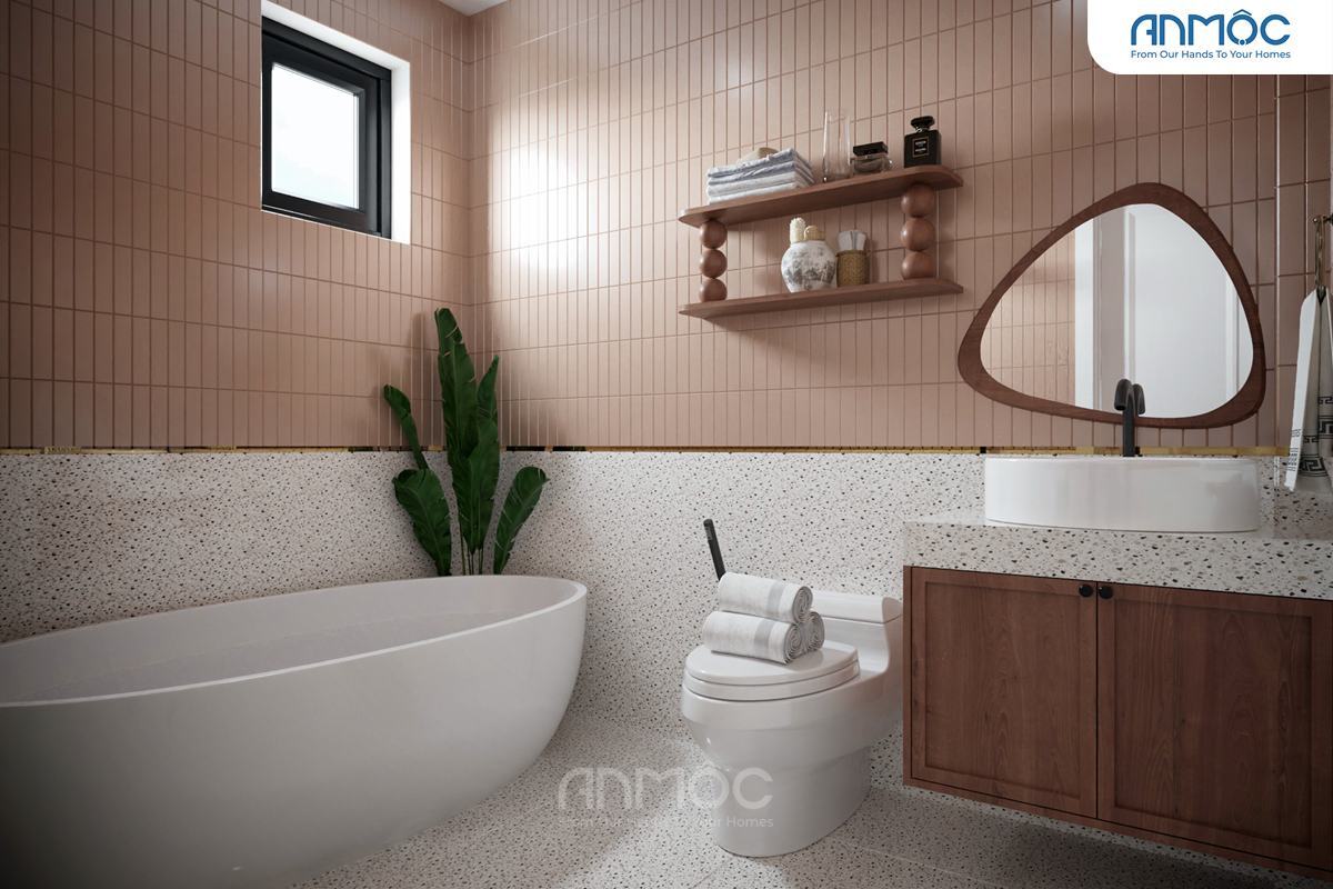21+ Mẫu Thiết Kế Nội Thất Nhà Phố Đẹp Không Thể Bỏ Qua 2026 2074 Phòng tắm master với bồn tắm độc lập màu trắng, tủ gỗ lavabo, gương hình hạt đậu và tường ốp gạch terrazzo kết hợp gạch hồng nhạt dọc