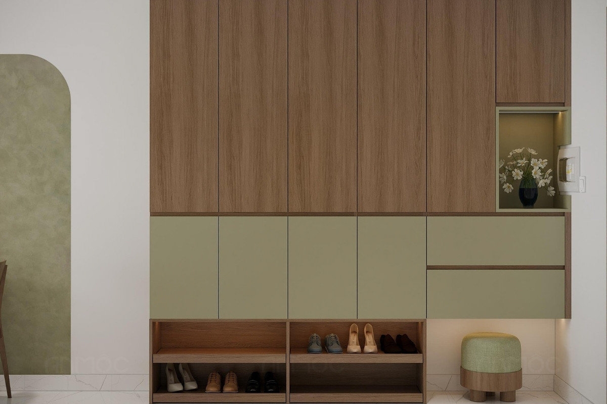 55+ Mẫu Thiết Kế Nội Thất Chung Cư "Đỉnh Nhất" 2026 2550 Không gian lưu trữ giày dép gọn gàng với hệ tủ gỗ và sắc xanh nhã nhặn, tạo điểm nhấn tinh tế cho không gian